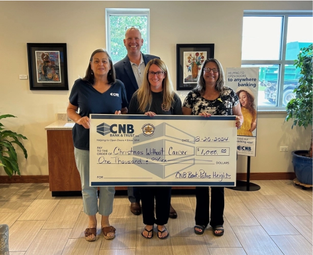 CNB presents check to Christmas Without Cancer